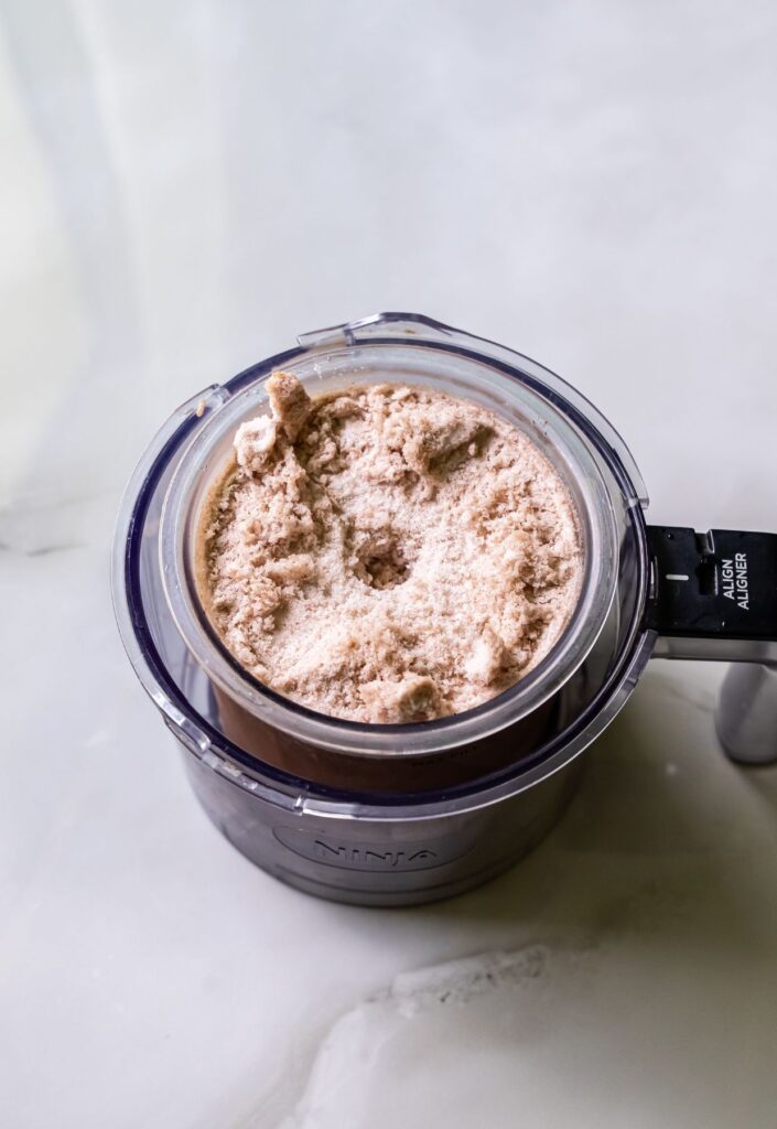 high protein chocolate ice cream in a clear pint.
