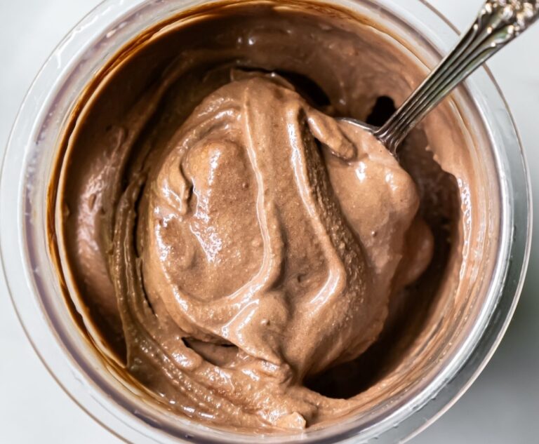 dark chocolate ice cream with a spoon.