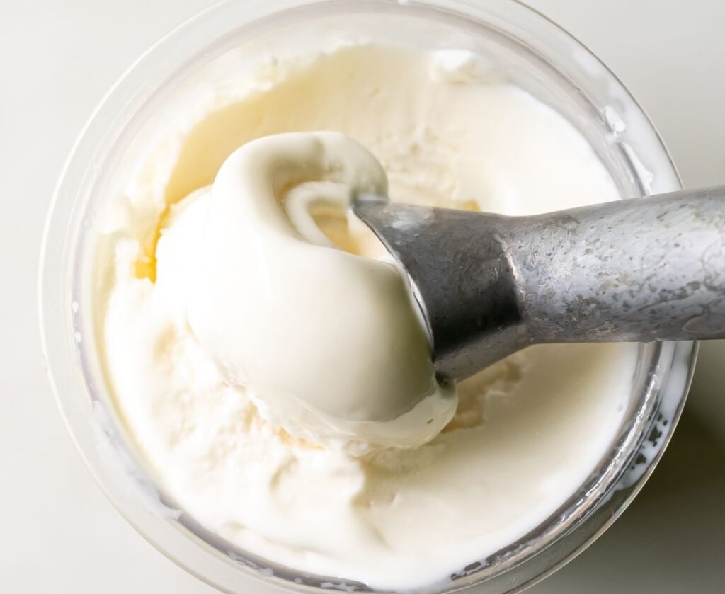 coconut ice cream with an ice cream scoop.