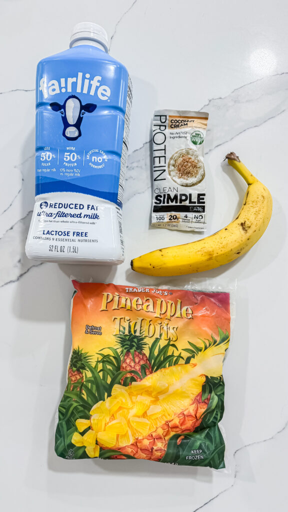 Ninja Creami Pina Colada Protein Ice Cream ingredients: fairlife milk, ripe banana, banana cream protein powder and frozen pineapple.