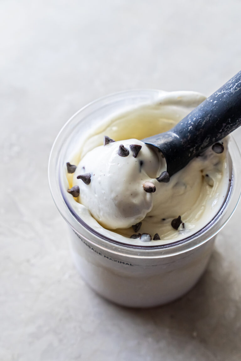 mint chocolate chip ice cream with an ice cream scoop.