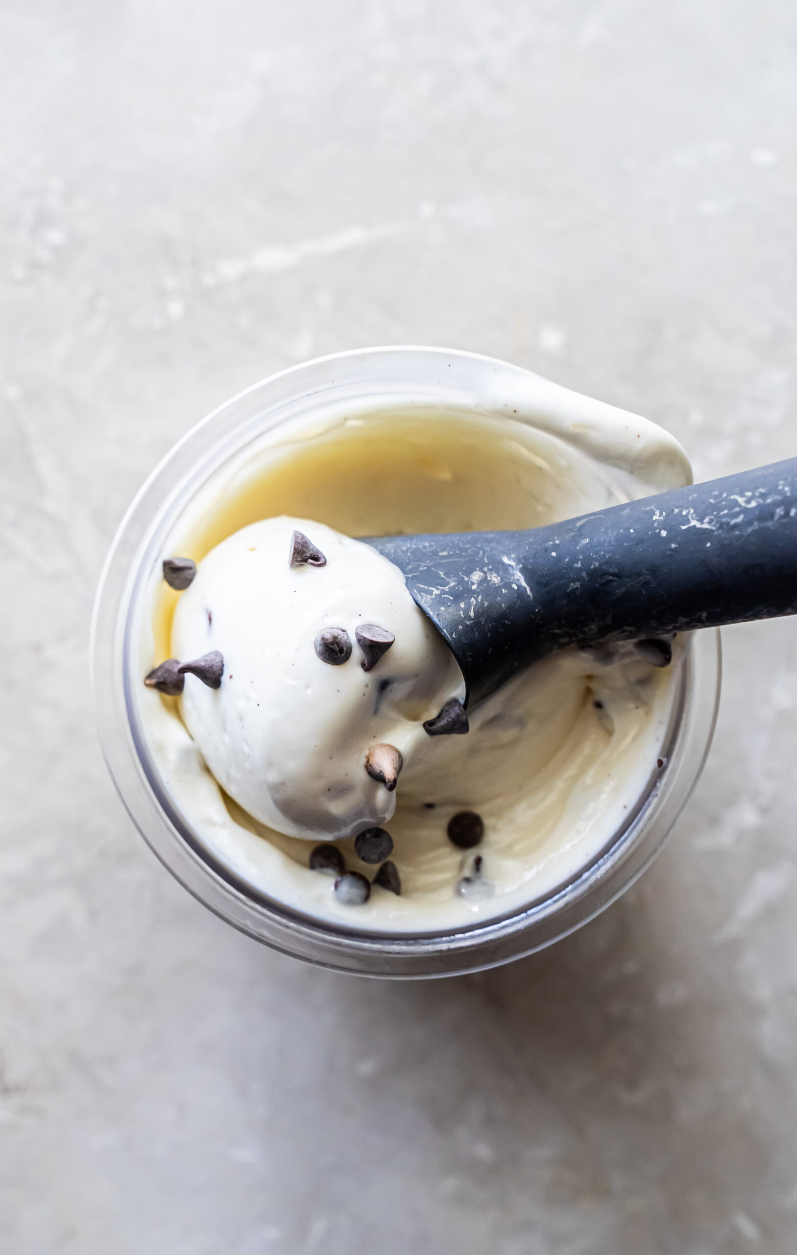 mint chocolate chip ice cream with an ice cream scoop.